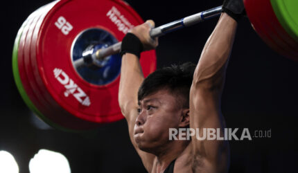 Rahmat Erwin Dominasi Kejuaraan Asia: Raih Emas dan Pecahkan Rekor Dunia!